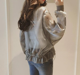 Transparente grau-weiße Oversize-Reißverschlussjacke